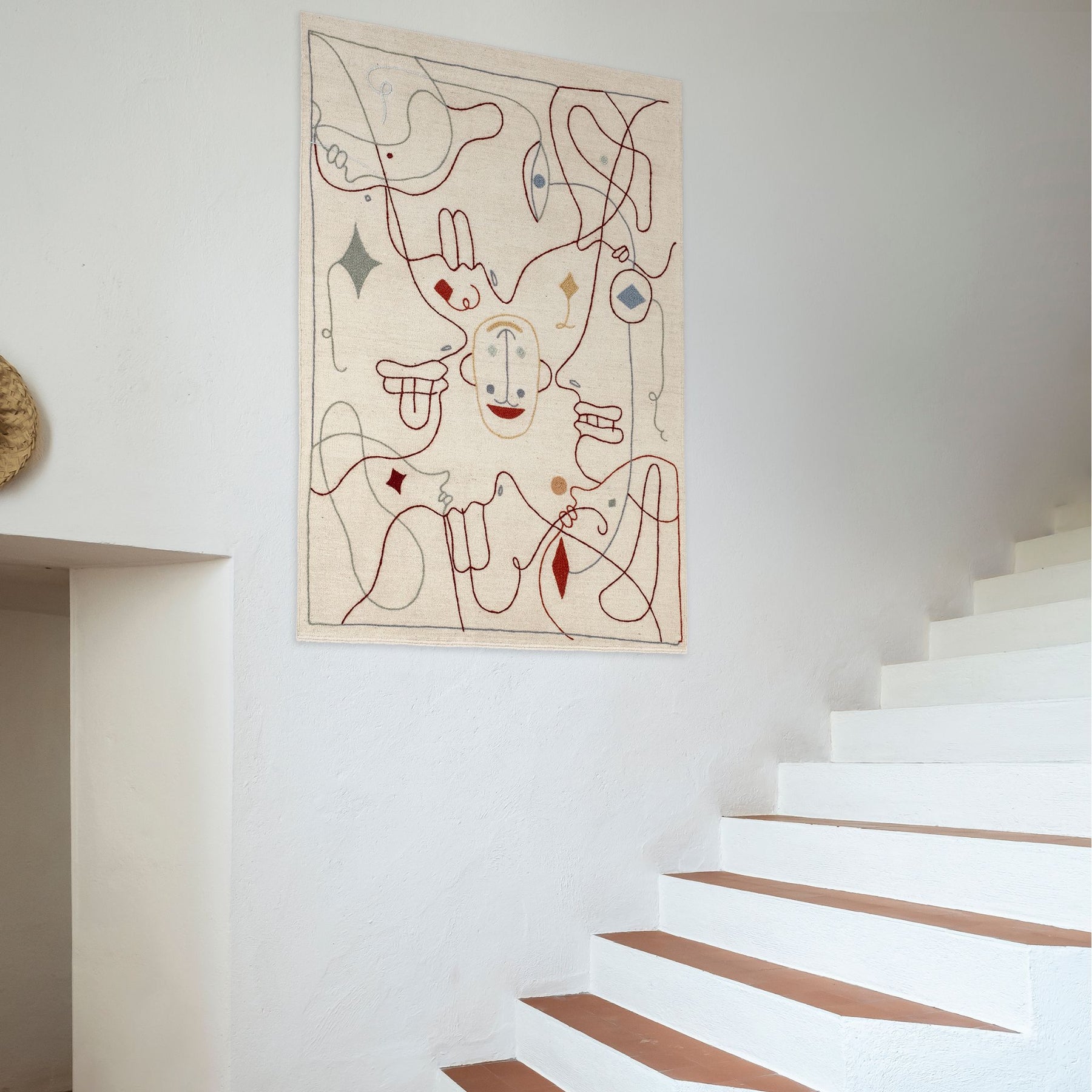 nanimarquina silhouette wall tapestry by Jaime Hayon in stairwell