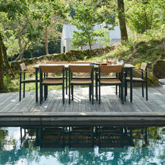 Pelagus Dining Table and Chairs Teak Hunter Green Outdoors by Pool with Reflection