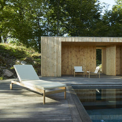 Pelagus Teak Sunbed with Sunbrella Cushion by Pool of Scandinavian Summer House