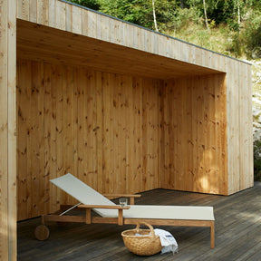 Pelagus Teak Sunbed with Picnic Basket on Pool Deck