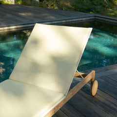 Pelagus Teak Sunbed with Sunbrella Honey Yellow Cushion by Pool