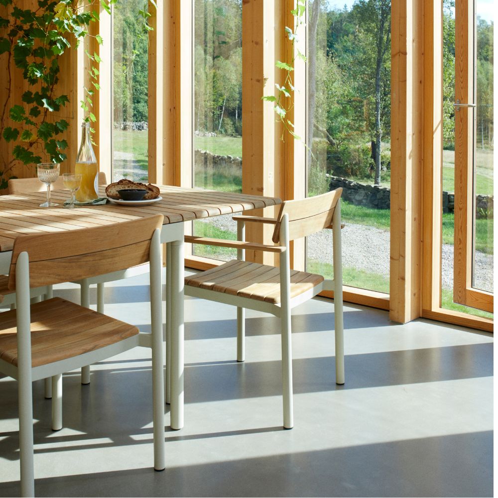 Pelagus Arm Chair Ivory and Teak with Pelagus Dining Table in Danish Summer House