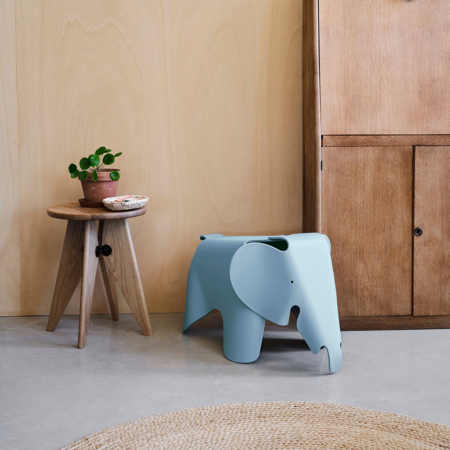 Vitra Eames Elephant Sky Blue RE in Room with Prouve Stool
