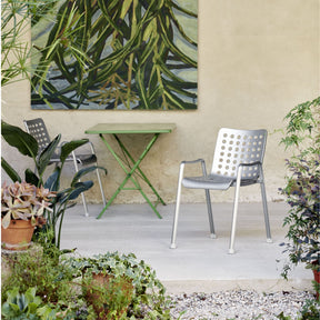 Vitra Landi Chairs by Hans Coray Outdoors with Rustic Green Bistro Table