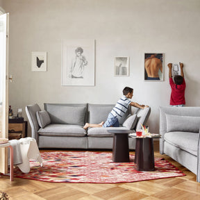 Vitra Mariposa Sofas in Living Room with nanimarquina Losanges Rug and Children Playing
