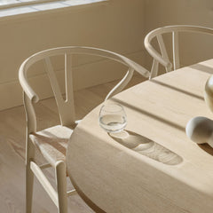 Carl Hansen Wegner Wishbone Chairs Ilse Crawford Soft Barley in Kitchen Bathed with Natural Light