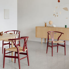 Carl Hansen Wegner Wishbone Chairs Ilse Crawford Soft Falu in room with CH825 Credenza and Calder Mobile