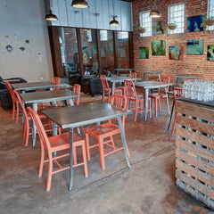 111 Navy Chairs by Emeco in the Bold Bean Riverside, Jacksonville, FL. By: Content Modern