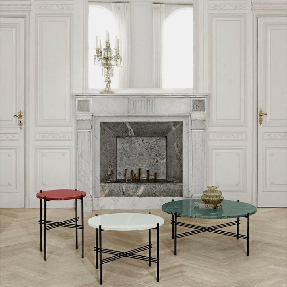 GUBI TS Coffee Tables by Gam Fratesi in room with fireplace