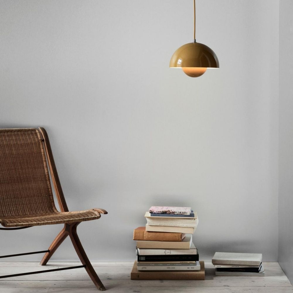 Verner Panton VP1 Pendant Light Mustard Yellow in room with chair and books