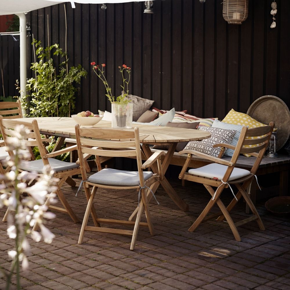 Selandia Armchairs with Cushions and Dining Table by Skagerak