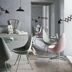 Arne Jacobsen Drop Chairs in Cafe with Kaiser Idell Pendants Fritz Hansen
