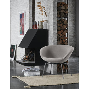 Arne Jacobsen Pot Chair by Fritz Hansen in Light Warm Grey in room with Art and Firewood