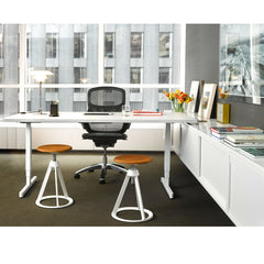 Barber Osgerby Adjustable Piton Stools in Room with Pixel Desk and Generation Chair Knoll