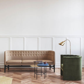 AJ7 Bellevue Floor Lamp in room with Arne Jacobsen Mayor Sofas and Loafer Chair &Tradition Copenhagen