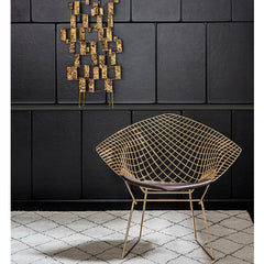Bertoia Diamond Chair Gold in room with Bertoia Sculpture Knoll