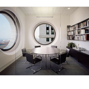 Black BRNO Flatbar Chairs in Conference Room with Round Table Mies van der Rohe for Knoll
