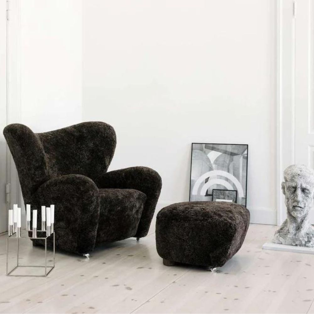 byLassen Tired Man Lounge Chair Espresso with Ottoman in room with Kubus candleholder