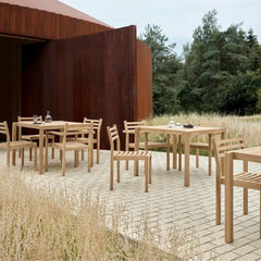 Carl Hansen AH501 Outdoor Raw Teak Dining Side Chair with AH502 Dining Chairs with Armrests and AH902 Dining Tables by Alfred Homann