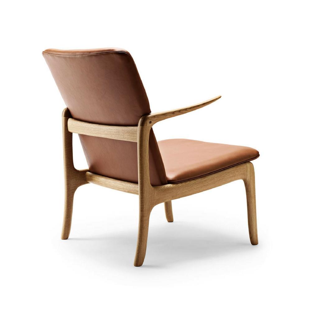 Ole Wanscher Beak chair in cognac leather with oak frame back view Carl Hansen and Son