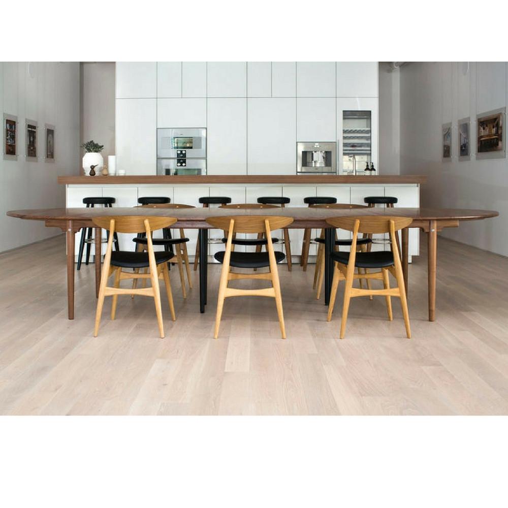 Hans Wegner bar stools and CH33 dining chairs in kitchen Carl Hansen and Son NY Showroom