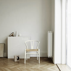 CH24 Wishbone Chairs Soft White with Sculptural Objects in Copenhagen