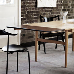 Carl Hansen Wegner CH327 Dining Table with Black Extension Plates and Mixed Black Wegner dining Chairs