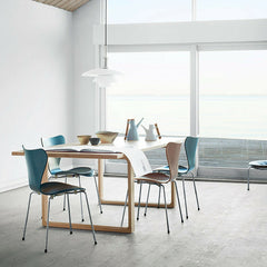 Cecilie Manz Essay Table in Room with Colored Series 7 Chairs