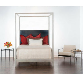 Charleston Forge Sloan Canopy Bed in Room with Collins side tables and Emmitt Lounge Chair