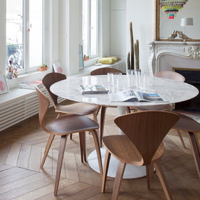 Cherner Chairs in Parisian Dining Room with Marble Saarinen Dining Table