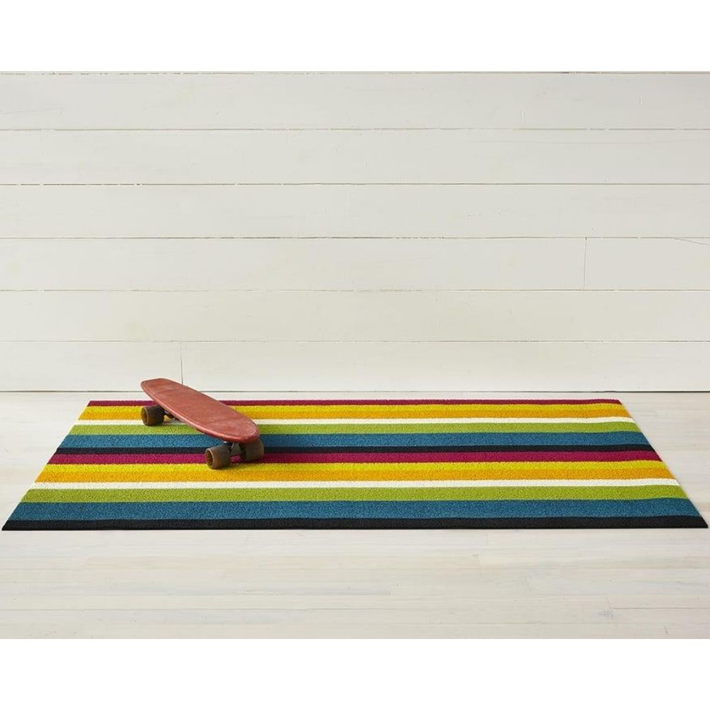 https://www.paletteandparlor.com/cdn/shop/products/chilewich-bold-stripe-shag-door-mat-multi-with-skate-board_1000x.jpg?v=1595787542
