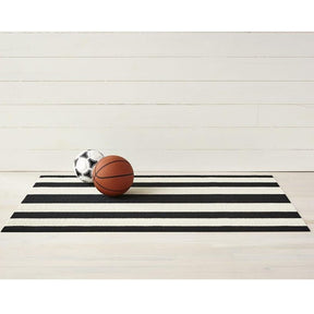 Chilewich Bold Stripe Doormat Black and White with Kid's Soccer ball and Basketball