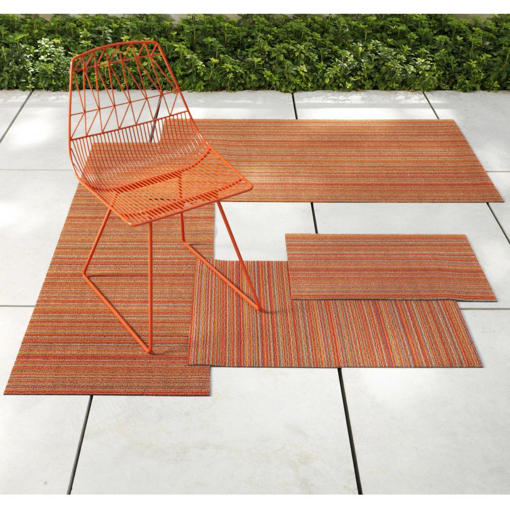 Bend Lucy Chair in Orange Outdoors with Chilewich Skinny Stripe Outdoor Rugs