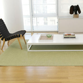 Chilewich Mini Basketweave Woven Floor Mat in Dill with Knoll's Jens Risom Lounge Chair