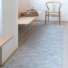 Chilewich Mosaic Runner Blue in room with Wegner Wishbone Chair