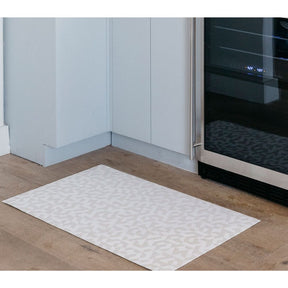 Chilewich Prism Floor Mat Natural in kitchen with wine refrigerator