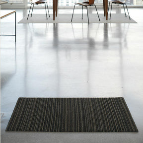 Chilewich Skinny Stripe Doormat with Fritz Hansen Series 7 Chairs