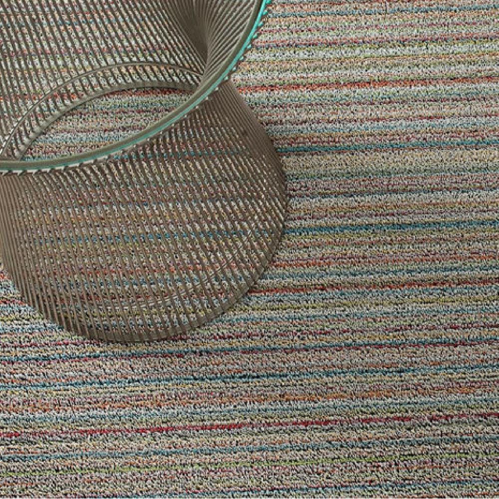 https://www.paletteandparlor.com/cdn/shop/products/chilewich-skinny-stripe-shag-floor-mat-soft-multi-with-knoll-platner-side-table_1000x.jpg?v=1598376986