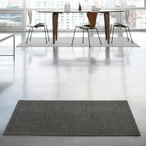 Chilewich Mercury Solid Indoor/Outdoor Shag Doormat with Fritz Hansen Series 7 Dining Chairs