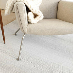 Chilewich Wave Floor Mat in Grey with Carl Hansen & Son Hans Wegner CH445 Wing Chair
