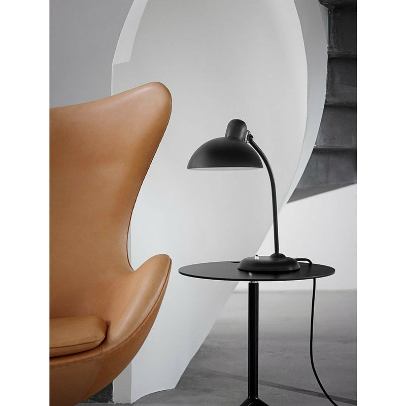 Christian Dell Kaiser Idell Tillable Tablelamp Matte Black with Arne Jacobsen Egg Chair and Kasper Salto Little Friend Fritz Hansen