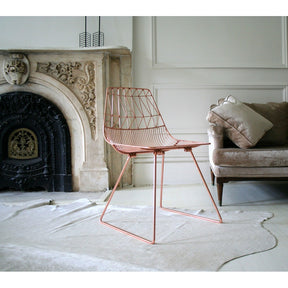 Bend Lucy Copper Chair in Room with Cowhide