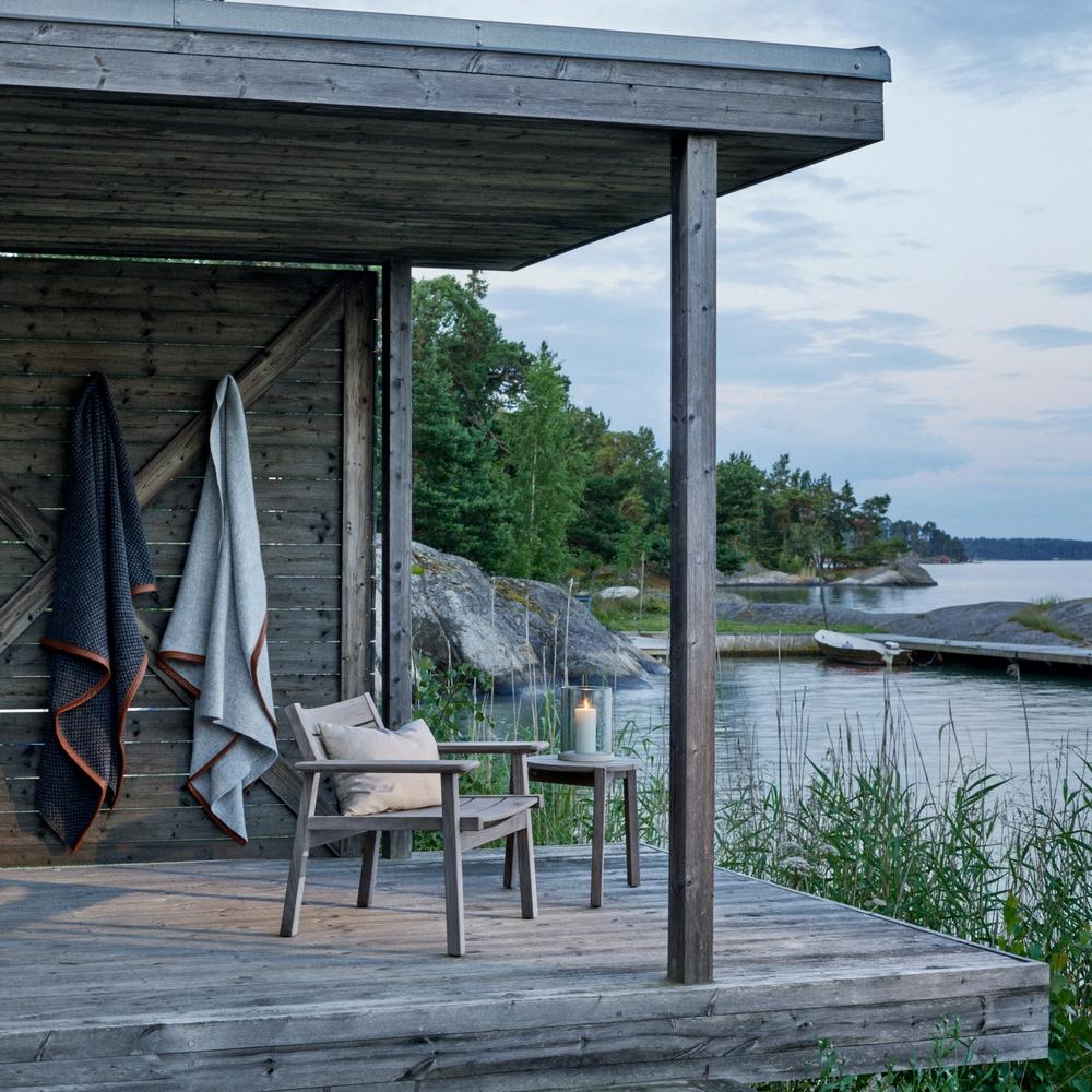 Djuro Teak Lounge Chair that has aged to a silvery grey