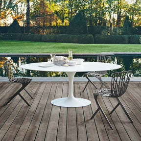 Saarinen Outdoor Dining Table with Adjaye Washington Skeleton Chairs