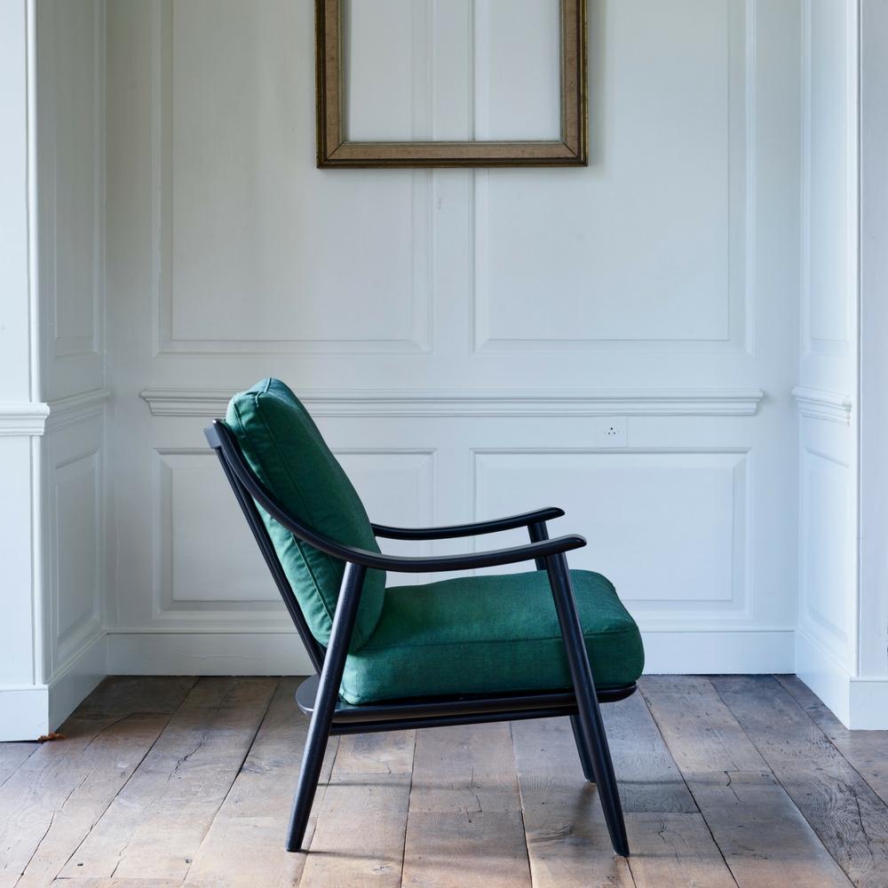 ercol Marino Chair black with green linen in room profile