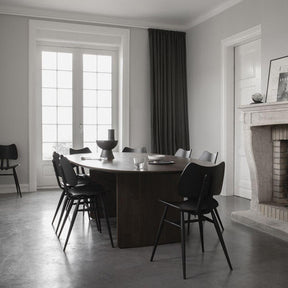 Ercol Black Butterfly Chairs in Dining Room with Walnut Pennon Dining Table
