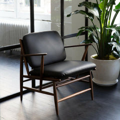 ercol Von Arm Chair by Atlason Walnut with Black Leather in situ