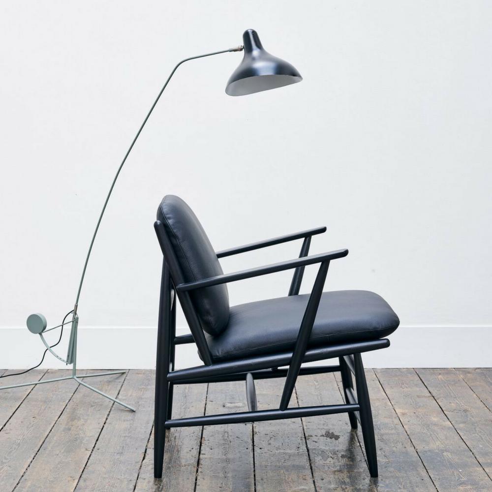 ercol Von Arm Chair in room with Mantis Lamp