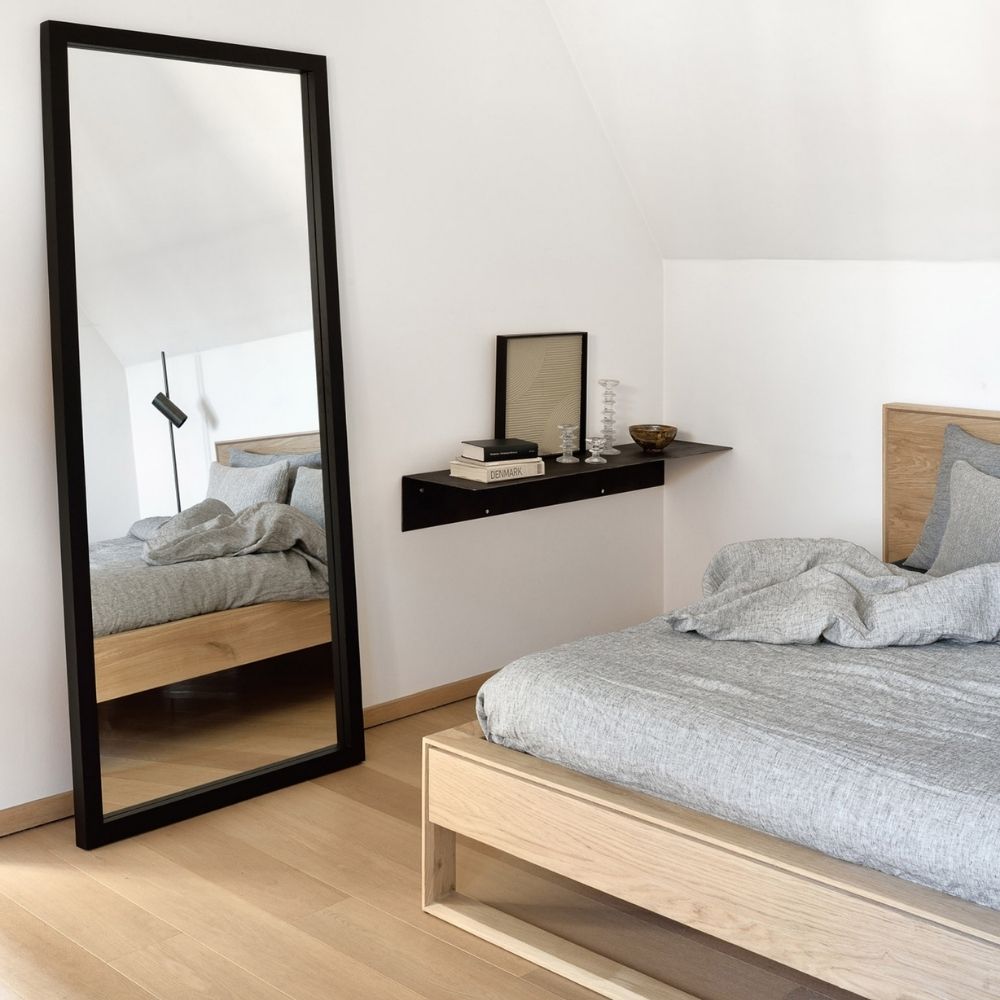 Ethnicraft Black Oak Light Frame Mirror 51289 in room with Nordic Bed