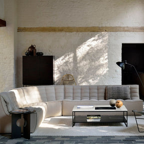 Ethnicraft N701 Modular Sofa in Living Room with Mantis Floor Lamp